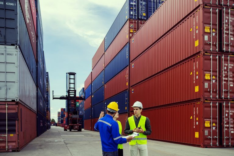 Foreman control loading Containers box to truck for Logistic Import Export.