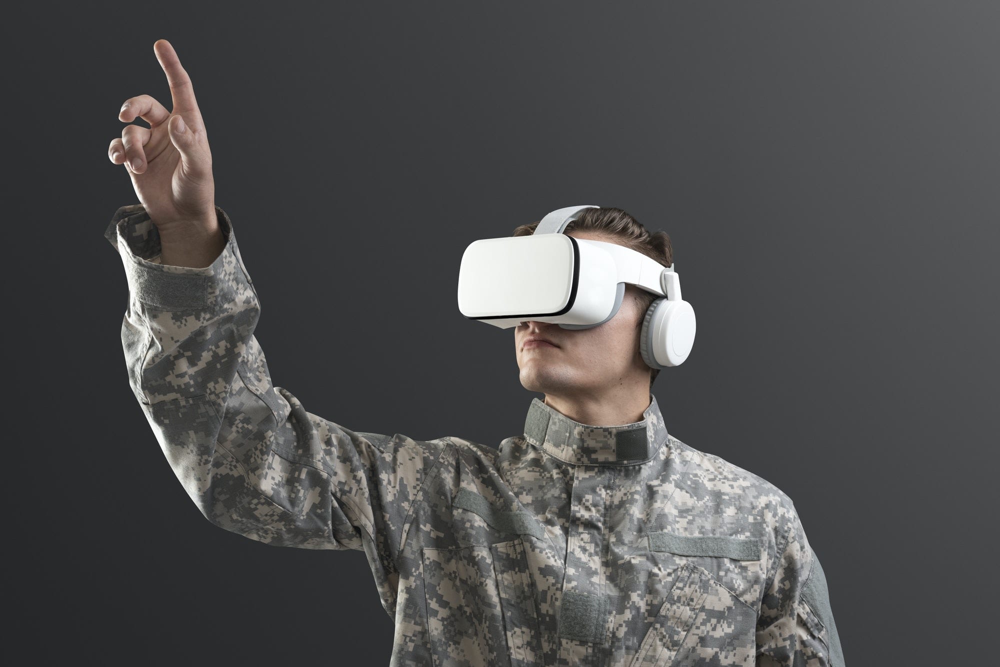Military man with VR headset in training military technology